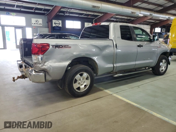 2010 Toyota Tundra 4WD Truck with VIN 5TFUY5F14AX138690, listed as a Copart auction lot 70699574 with 207,326 mi miles and Clean Title. Bid and sale history available at carsss.com. Image 3.