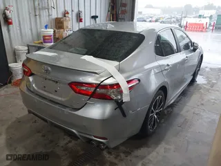 2018 Toyota Camry LE with VIN 4T1B11HK3JU113318, listed as a IAAI auction lot 41972881 with 76,420 mi miles. Bid and sale history available at carsss.com. Image 4.