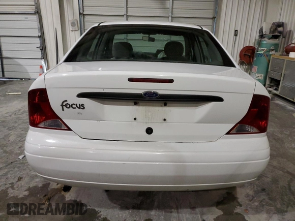 2002 Ford Focus LX with VIN 1FAFP33P52W126344, listed as a Copart auction lot 49757324 with 140,612 mi miles and Salvage Title. Bid and sale history available at DreamBid. Image 6.