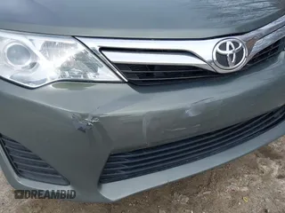 2012 Toyota Camry L with VIN 4T1BF1FK3CU619416, listed as a IAAI auction lot 42020573 with 74,325 mi miles and . Bid and sale history available at carsss.com. Image 19.