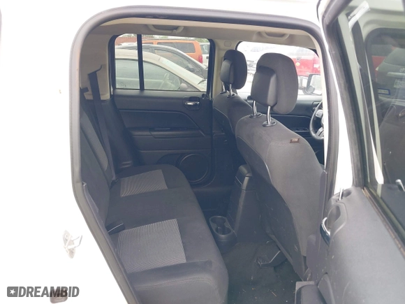 2016 Jeep Patriot Sport with VIN 1C4NJPBBXGD562646, listed as a IAAI auction lot 41929451 with 170,460 mi miles. Bid and sale history available at carsss.com. Image 8.