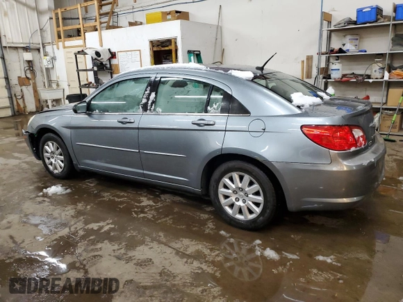 2010 Chrysler Sebring Touring with VIN 1C3CC4FBXAN194971, listed as a Copart auction lot 78848504 with 218,885 mi miles and Salvage Title. Bid and sale history available at carsss.com. Image 2.