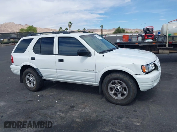 2001 Isuzu Rodeo S with VIN 4S2CK58W614329085, listed as a IAAI auction lot 42303013 with 171,933 mi miles and . Bid and sale history available at DreamBid. Image 13.