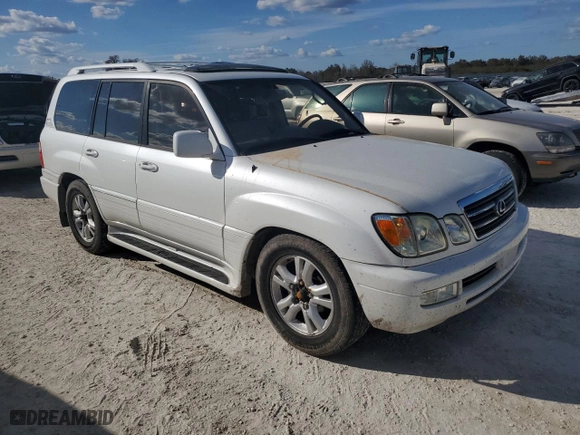 2003 Lexus LX 470 with VIN JTJHT00W833533180, listed as a Copart auction lot 75102374 with 0 mi miles and Non Repairable. Bid and sale history available at carsss.com. Image 4.