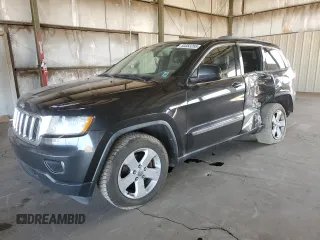 2011 Jeep Grand Cherokee Laredo z VIN 1J4RR4GG7BC529769, wystawiony jako Copart lot #53383265 z przebiegiem 159 529 mil mil oraz Szkoda całkowita • Salvage title. Historia ofert i sprzedaży dostępna na DreamBid. Obrazek 1.
