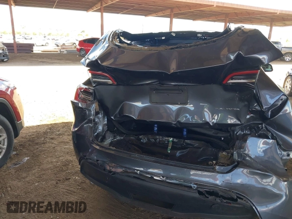 2023 Tesla Model Y Long Range with VIN 7SAYGDEE4PF875915, listed as a IAAI auction lot 42095178 with 11,928 mi miles and . Bid and sale history available at DreamBid. Image 6.