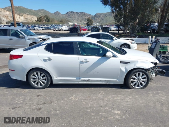 2015 Kia Optima LX with VIN KNAGM4A72F5616233, listed as a IAAI auction lot 41824232 with 163,006 mi miles. Bid and sale history available at carsss.com. Image 13.