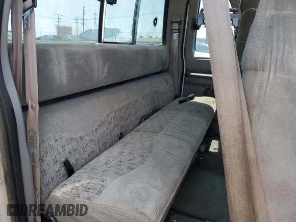 1999 Ford F-250 XL with VIN 1FTNX20L8XEB01923, listed as a Copart auction lot 65404495 with 383,297 mi miles and Salvage title. Bid and sale history available at DreamBid. Image 10.