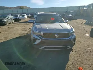 2023 Volkswagen Taos SE z VIN 3VVNX7B21PM308277, wystawiony jako Copart lot #82367714 z przebiegiem Nie podano mil oraz Nie do naprawy • Non repairable. Historia ofert i sprzedaży dostępna na DreamBid. Obrazek 11.