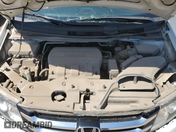 2015 Honda Odyssey Touring Elite with VIN 5FNRL5H92FB504977, listed as a Copart auction lot 56657195 with 189,438 mi miles and Salvage title. Bid and sale history available at DreamBid. Image 12.