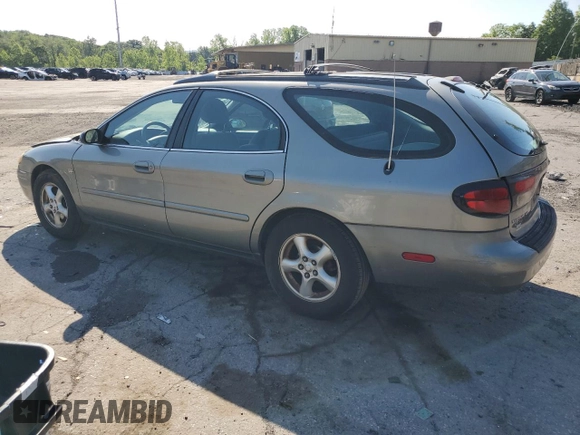 2004 Ford Taurus SE with VIN 1FAFP58S44A108250, listed as a Copart auction lot 58520615 with 119,575 mi miles and Salvage title. Bid and sale history available at DreamBid. Image 2.
