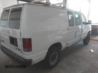 2011 Ford Econoline Cargo Commercial with VIN 1FTNE2EW9BDB11058, listed as a IAAI auction lot 42202069 with 282,179 mi miles. Bid and sale history available at carsss.com. Image 4.