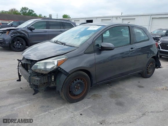 2015 Toyota Yaris L with VIN VNKJTUD32FA017299, listed as a IAAI auction lot 41862473 with 106,108 mi miles. Bid and sale history available at carsss.com. Image 2.