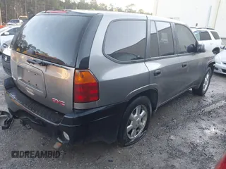 2005 GMC Envoy SLE with VIN 1GKDS13S352215032, listed as a IAAI auction lot 41221612 with 260,647 mi miles and . Bid and sale history available at DreamBid. Image 4.