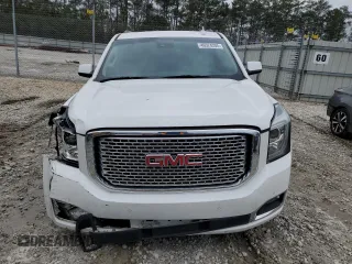 2015 GMC Yukon Denali with VIN 1GKS1CKJ1FR526594, listed as a Copart auction lot 46524205 with 99,095 mi miles and Salvage Title. Bid and sale history available at carsss.com. Image 5.