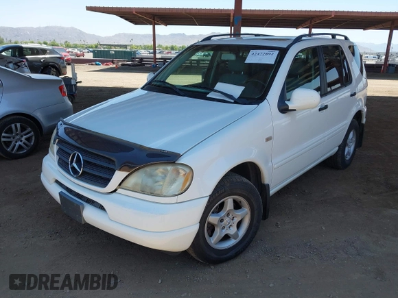 2000 Mercedes-Benz M 320/430/500 z VIN 4JGAB54E5YA157431, wystawiony jako IAAI lot #42472892 z przebiegiem 125 973 mil mil oraz . Historia ofert i sprzedaży dostępna na DreamBid. Obrazek 6.