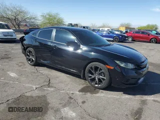 2019 Honda Civic Sport with VIN 19XFC2F83KE203341, listed as a Copart auction lot 52911825 with 120,011 mi miles and Salvage title. Bid and sale history available at DreamBid. Image 4.