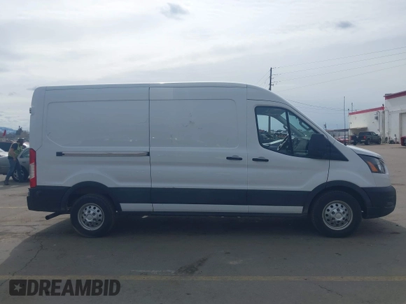2020 Ford Transit Cargo with VIN 1FTBR2CG1LKB43034, listed as a IAAI auction lot 41668193 with 56,827 mi miles and . Bid and sale history available at DreamBid. Image 13.