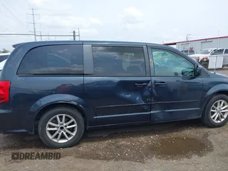 2013 Dodge Grand Caravan SXT with VIN 2C4RDGCGXDR749803, listed as a IAAI auction lot 42118722 with 264,454 mi miles and . Bid and sale history available at DreamBid. Image 13.