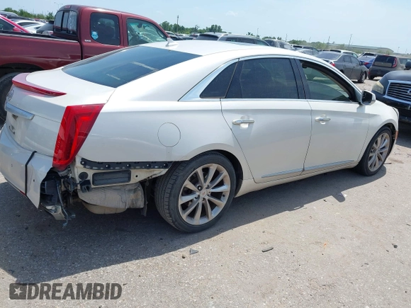 2013 Cadillac XTS Premium z VIN 2G61S5S33D9235025, wystawiony jako IAAI lot #42288742 z przebiegiem 180 221 mil mil oraz . Historia ofert i sprzedaży dostępna na DreamBid. Obrazek 4.