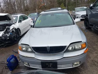 2002 Lincoln LS w/Base Pkg with VIN 1LNHM87A12Y607979, listed as a IAAI auction lot 41523445 with 174,826 mi miles. Bid and sale history available at carsss.com. Image 12.