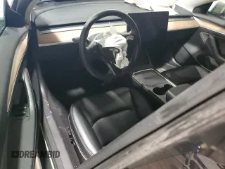 2023 Tesla Model 3 with VIN 5YJ3E1EA6PF588701, listed as a Copart auction lot 61446355 with Not provided miles and Salvage title. Bid and sale history available at DreamBid. Image 8.