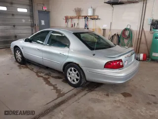 2003 Mercury Sable LS Premium with VIN 1MEFM55S63G621064, listed as a IAAI auction lot 42099656 with 182,862 mi miles. Bid and sale history available at carsss.com. Image 3.