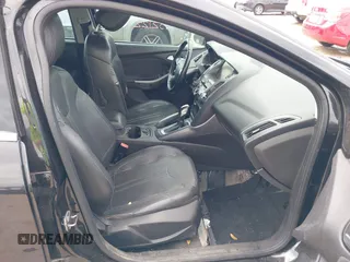 2013 Ford Focus Titanium with VIN 1FADP3J23DL152122, listed as a IAAI auction lot 41935180 with 175,065 mi miles and . Bid and sale history available at carsss.com. Image 5.