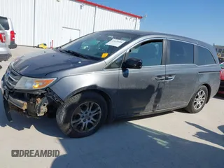 2012 Honda Odyssey EX-L with VIN 5FNRL5H69CB128585, listed as a IAAI auction lot 41695109 with 231,565 mi miles and . Bid and sale history available at carsss.com. Image 14.