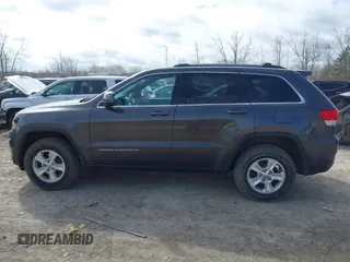 2015 Jeep Grand Cherokee Laredo with VIN 1C4RJFAG6FC140581, listed as a IAAI auction lot 41869952 with 193,295 mi miles. Bid and sale history available at carsss.com. Image 14.