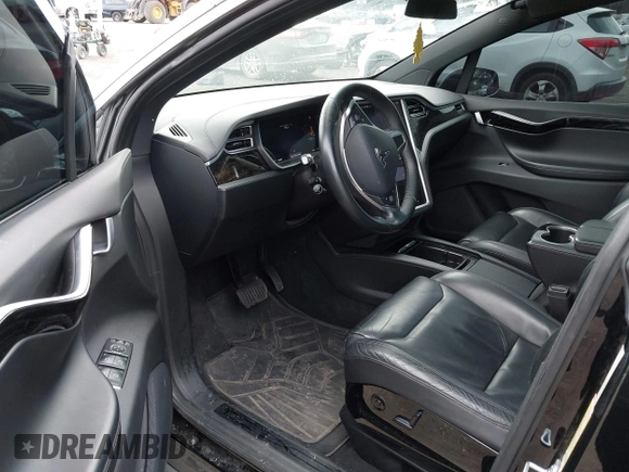 2016 Tesla Model X 70D with VIN 5YJXCBE20GF013046, listed as a IAAI auction lot 41944005 with 94,509 mi miles. Bid and sale history available at carsss.com. Image 5.