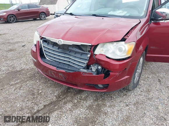 2010 Chrysler Town & Country Limited z VIN 2A4RR7DX7AR366259, wystawiony jako IAAI lot #42310955 z przebiegiem 133 213 mil mil oraz . Historia ofert i sprzedaży dostępna na DreamBid. Obrazek 6.