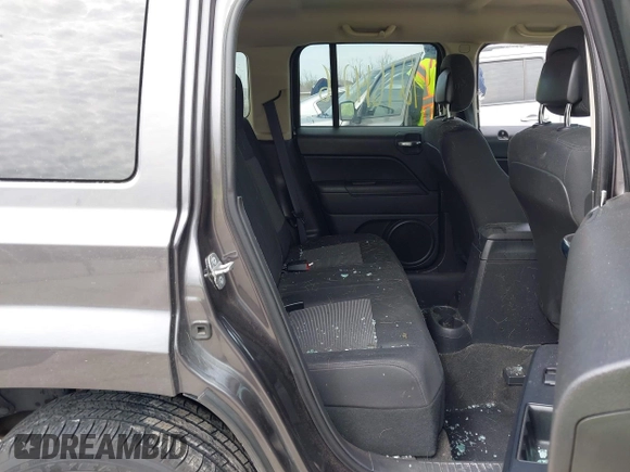 2014 Jeep Patriot Latitude with VIN 1C4NJRFB3ED731313, listed as a IAAI auction lot 42161426 with 118,858 mi miles and . Bid and sale history available at DreamBid. Image 8.