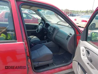 2006 Ford Escape XLS with VIN 1FMYU02Z06KB10283, listed as a IAAI auction lot 42208599 with 199,589 mi miles and . Bid and sale history available at DreamBid. Image 5.