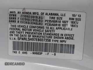 2014 Honda Odyssey Touring with VIN 5FNRL5H97EB037358, listed as a IAAI auction lot 41832825 with 208,894 mi miles and . Bid and sale history available at DreamBid. Image 9.