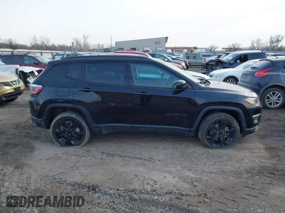 2020 Jeep Compass Latitude with VIN 3C4NJDBB9LT137387, listed as a IAAI auction lot 41379552 with 79,083 mi miles and . Bid and sale history available at carsss.com. Image 13.