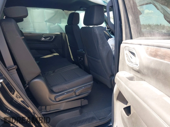2023 Chevrolet Tahoe LS z VIN 1GNSCMKD9PR282840, wystawiony jako IAAI lot #41904280 z przebiegiem 73 298 mil mil oraz . Historia ofert i sprzedaży dostępna na DreamBid. Obrazek 8.