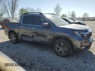 2023 Honda Ridgeline RTL-E with VIN 5FPYK3F74PB006003, listed as a Copart auction lot 55276305 with 26,095 mi miles and Clean title. Bid and sale history available at DreamBid. Image 4.