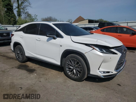 2022 Lexus RX with VIN 2T2SZMDA2NC309843, listed as a Copart auction lot 54670415 with 54,298 mi miles and Salvage Title. Bid and sale history available at carsss.com. Image 4.