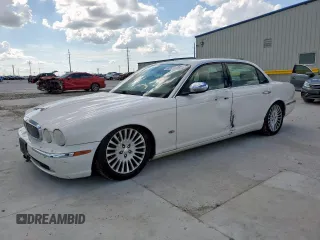2006 Jaguar XJ Vanden Plas with VIN SAJWA82B16SH06996, listed as a Copart auction lot 62509025 with 80,236 mi miles and Salvage title. Bid and sale history available at DreamBid. Image 1.