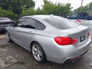 2016 BMW 4 Series 428i xDrive z VIN WBA4C9C57GG137858, wystawiony jako IAAI lot #42755021 z przebiegiem 92 728 mil mil oraz . Historia ofert i sprzedaży dostępna na DreamBid. Obrazek 3.