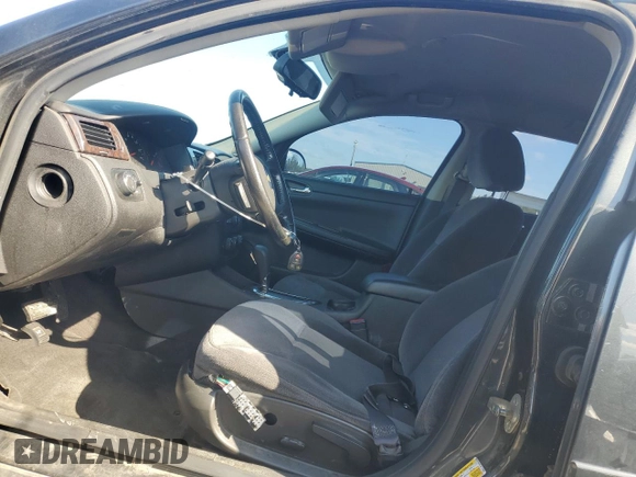 2014 Chevrolet Impala LS with VIN 2G1WA5E35E1162086, listed as a Copart auction lot 51921465 with 169,520 mi miles and Salvage Title. Bid and sale history available at DreamBid. Image 7.