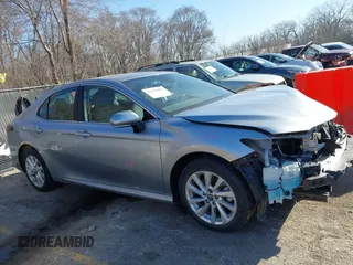 2023 Toyota Camry LE z VIN 4T1C11AK1PU771615, wystawiony jako IAAI lot #41679085 z przebiegiem 20 230 mil mil oraz . Historia ofert i sprzedaży dostępna na DreamBid. Obrazek 14.