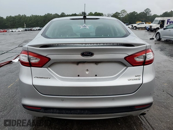 2016 Ford Fusion SE Hybrid z VIN 3FA6P0LUXGR350997, wystawiony jako Copart lot #62301825 z przebiegiem 267 537 mil mil oraz Szkoda całkowita • Salvage title. Historia ofert i sprzedaży dostępna na DreamBid. Obrazek 6.