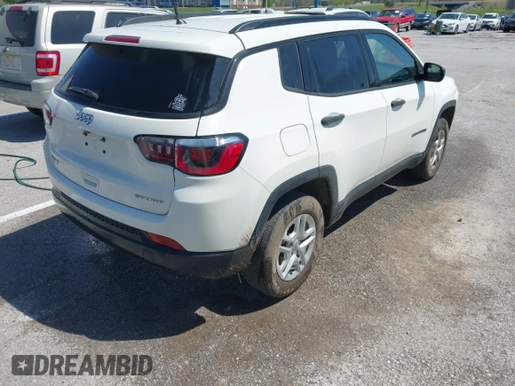2018 Jeep Compass Sport with VIN 3C4NJDAB5JT146182, listed as a IAAI auction lot 42041839 with 55,865 mi miles and . Bid and sale history available at DreamBid. Image 4.