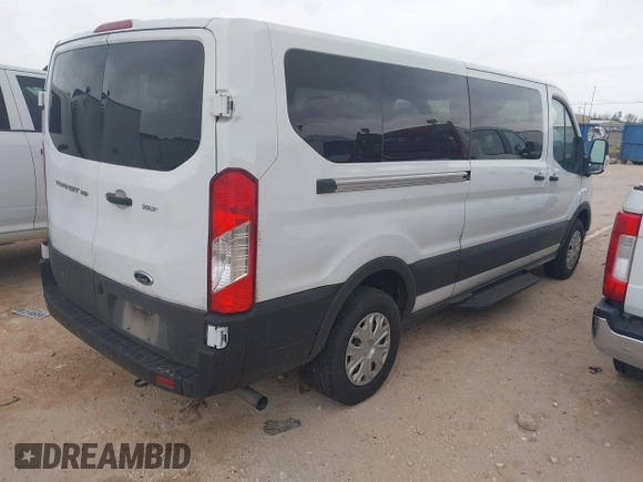 2023 Ford Transit Passenger XL with VIN 1FBAX2Y81PKA57414, listed as a IAAI auction lot 42418993 with 82,592 mi miles and . Bid and sale history available at DreamBid. Image 4.