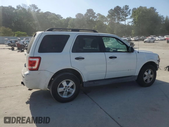 2009 Ford Escape XLS with VIN 1FMCU02719KB53740, listed as a Copart auction lot 55210035 with 144,672 mi miles and Salvage title. Bid and sale history available at DreamBid. Image 3.