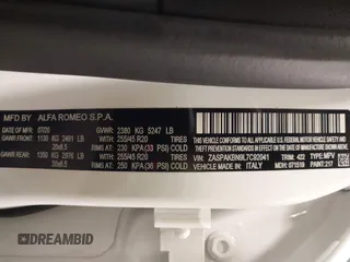 2020 Alfa Romeo Stelvio Ti z VIN ZASPAKBN9L7C92041, wystawiony jako IAAI lot #41329129 z przebiegiem 47 977 mil mil oraz . Historia ofert i sprzedaży dostępna na DreamBid. Obrazek 9.