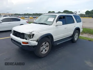 1998 Toyota 4Runner SR5 z VIN JT3GN86R5W0060650, wystawiony jako IAAI lot #42373192 z przebiegiem 264 886 mil mil oraz . Historia ofert i sprzedaży dostępna na DreamBid. Obrazek 18.