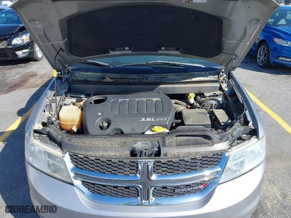 2015 Dodge Journey SXT with VIN 3C4PDCBG4FT656826, listed as a IAAI auction lot 41981425 with 131,847 mi miles. Bid and sale history available at carsss.com. Image 10.